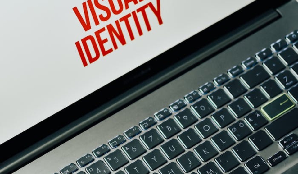 Laptop screen showing text on brand personality and visual identity for marketing strategy.